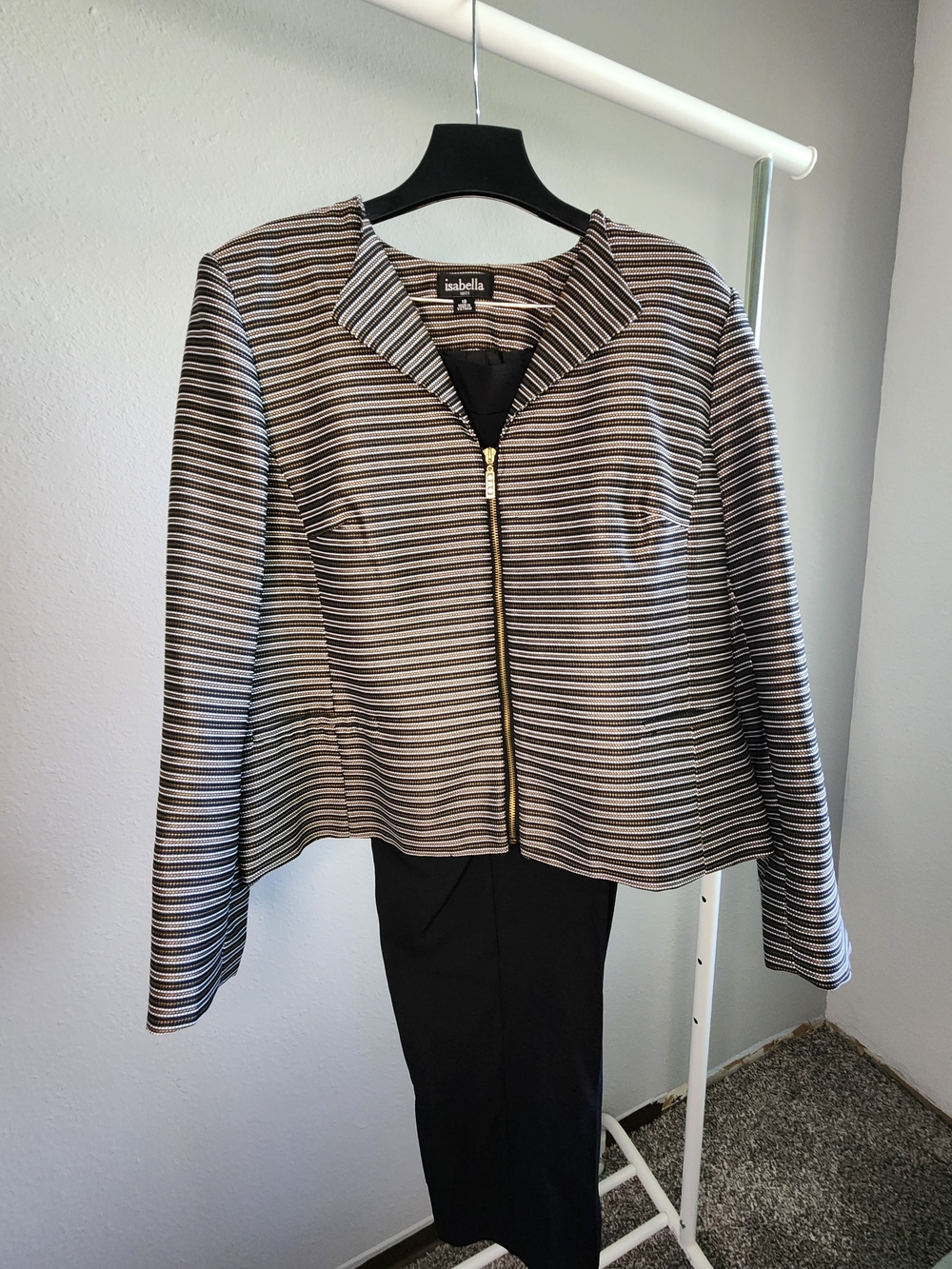 Isabella Suits Women’s Black & White Striped Zip Jacket With Black Pants.